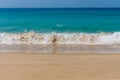 Ocean tide waves on paradise sandy beach