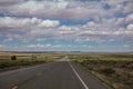 Long highway, cloudy blue sky. Monument Valley Navajo nation, Arizona-Utah USA