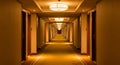 Long Hotel Corridor with Repeating Doors and Illuminated Ceiling Lights Stretching into Infinity hallway Royalty Free Stock Photo