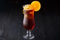 Long Island Ice Tea cocktail on black background Royalty Free Stock Photo