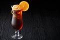 Long Island Ice Tea cocktail on black background Royalty Free Stock Photo