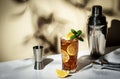 Long Island ice tea cocktail with vodka, rum, tequila, gin, liquor, lemon juice, cola and ice, garnished with lemon slice and mint Royalty Free Stock Photo