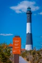 LONG ISLAND, USA, APRIL, 04, 2018: Outdoor view of orange informative sign of lighthouse center located at outdoors of