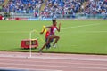 Athlete running to the takeoff board Royalty Free Stock Photo