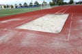 long jump pit in sports stadium Royalty Free Stock Photo