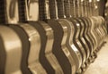 Long line of new acoustic guitars in store Royalty Free Stock Photo