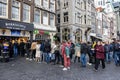 Long Line of People at a Popular Amsterdam Frite Shop Manneken Pis