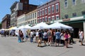 Long line of vendors selling their food and crafts during the Cheese Trail Celebration, Little Falls, New York, 2019