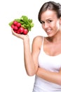 Long live healthily - Beautiful woman holding a bunch of radishes Royalty Free Stock Photo