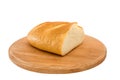 Long loaf on a wooden board on a white background Royalty Free Stock Photo