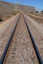 A long and lonesome set of railway tracks Royalty Free Stock Photo