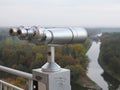 The long metal binocular with river landscape Royalty Free Stock Photo