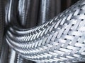 Long metal flexible compensator pipes metal texture Royalty Free Stock Photo