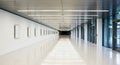 Long Modern White Hallway with Rows of Lights and Artwork on Wall corridor interior Royalty Free Stock Photo