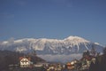 Long mountain range covered in snow and blue sky background Royalty Free Stock Photo