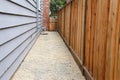 Pathway between house and fence down side yard