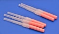 Long Needles used for puncturing artery or vein secured with cap. Royalty Free Stock Photo