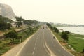 A long one Point Perspective of train transport track and road. Royalty Free Stock Photo