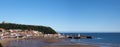 Long panoramic view of town of Scarborough from the beach on the south bay Royalty Free Stock Photo