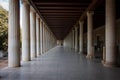A long passage between many old columns Royalty Free Stock Photo