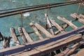 Long pedestrian suspension bridge over the mountain river Bzyb on a sunny autumn day in Abkhazia Royalty Free Stock Photo