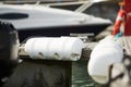 Long pier blue fenders for a boat and dockside for protection. Maritime fenders Royalty Free Stock Photo