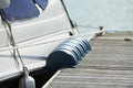 Long pier blue fenders for a boat and dockside for protection. Maritime fenders Royalty Free Stock Photo