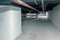 an long pipe in a technical room in the basement of a large building Royalty Free Stock Photo