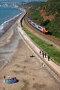 Promenade beteen Dawlish Warren and Dawlish town with train passing