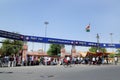 Long queue of Indian migrant laborers outside the railway station waiting to leave the city due to covid-19 pandemic