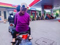 Long queue of motorbikes at petrol stations in Jakarta, Indonesia. Royalty Free Stock Photo