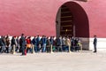 Long queue of tourists are waiting for passing throught the Tiananmen gate and entering the Forbidden City in Beijing, China