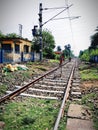 Long rail line going to the horizon blocked for maintenance work. Royalty Free Stock Photo