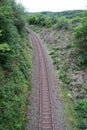 long railroad curve in a valley of the Eifel near Monreal Royalty Free Stock Photo