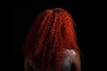 Long Red Afro Curls , Rear View On Black Background. Generative AI