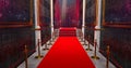 Long red carpet between rope barriers on entrance. Way to success on the red carpet. The path to glory. Stairway go up. Royalty Free Stock Photo