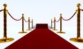 long red carpet between rope barriers