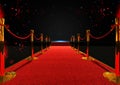 Long red carpet between rope barriers