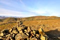 Sunlight on the marker cairn of Dove Crag