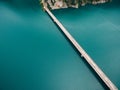 Long road bridge across Lake Piva in Montenegro. Drone
