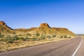 Long Road In The Kimberley Curving Around a Mesa