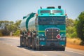 Long Road Train in the Australian Outback with trailer bringing fuel Royalty Free Stock Photo