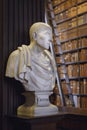 The Long Room interior Of The Old Library At Trinity College. Marble busts of great people and shelves with antique tomes Royalty Free Stock Photo