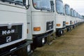 Long row of new MAN VW trucks waiting to be delivered UK 1986