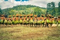 Long row of men in Papua New Guinea