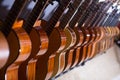 Line of new acoustic guitars in store Royalty Free Stock Photo