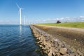 Long row off shore wind turbines in the Dutch sea Royalty Free Stock Photo