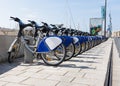 A long row of rental bikes Royalty Free Stock Photo