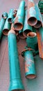 Long rusty green irons were neatly arranged on the floor