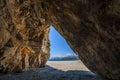 Stunning cave in the long sandy beach of triopetra